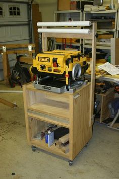 a workbench with tools on it in a garage