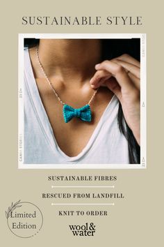 The collarbone and upper chest of an Indian woman wearing a white v-neck t-shirt and a green knitted mini bow tie necklace on a silver chain. Her hand gently touches the chain. Eco Friendly Accessories, Knitted Design, Chic Aesthetic, Eco Chic