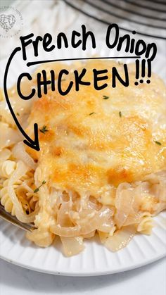 a white plate topped with macaroni and cheese next to a fork that says french onion chicken