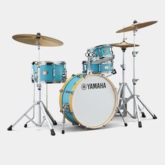 the yamaha drum set is shown in blue and white with black hardware on each side