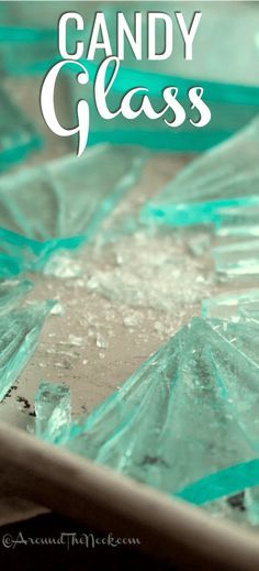 a close up of some glass with the words candy glass on it and an image of ice