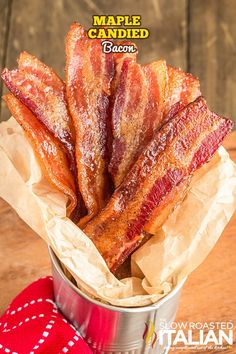 some bacon sticks are in a tin on a table