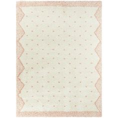 a white rug with pink dots on it