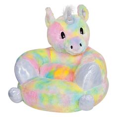 a stuffed animal sitting on top of a bean bag chair covered in rainbow dyes