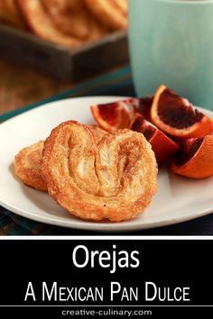 an image of mexican pancakes on a plate with coffee and oranges in the background