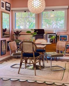 a living room filled with lots of furniture and decor