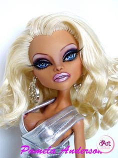 a barbie doll with blonde hair and blue eyes wearing a silver dress, earrings and jewelry