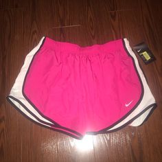 New With Tags Lined Inside Pink Athletic Shorts For Spring Workout, Pink Sports Shorts For Spring, Pink Sports Bottoms For Spring, Pink Nike Athletic Shorts For Spring, Nike Pink Athletic Shorts For Spring, Spring Nike Pink Athletic Shorts, Nike Pink Athletic Shorts For Summer, Pink Sporty Shorts For Spring, Sporty Pink Shorts For Spring