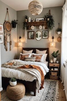 a bed sitting in a bedroom next to a wooden shelf filled with potted plants