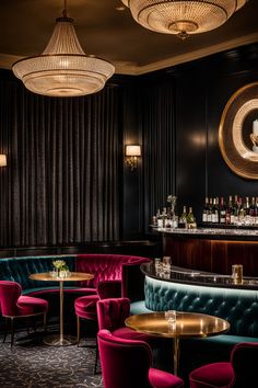 an elegant bar with pink velvet chairs and gold trimmings, surrounded by round chandeliers