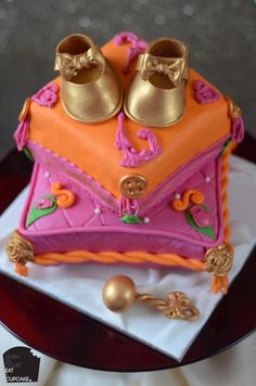 a cake with shoes on top of it