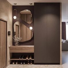 a bathroom with a large mirror on the wall next to a walk in closet that also has shoes