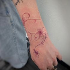 a person with a tattoo on their arm