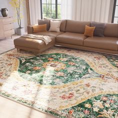 a living room with a large rug on the floor next to a couch and coffee table