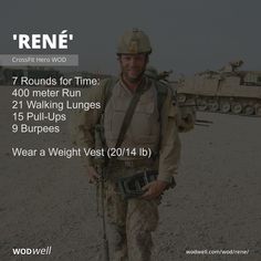 a man in uniform holding a radio and walking through the desert with tanks behind him