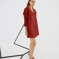 Vegan leather mini dress in red with V shaped sleeve details. Material: 100% Polyurethane (vegan leather) Vegan Leather Dress, Red Leather Mini Dress, Mini Red Leather Dress, Red V-neck Mini Dress For Daywear, Chic Red V-neck Shirt Dress, Red Leather Dress, Red Leather-lined Bags For Shopping, 3d Printing Fashion, Leather Mini Dress