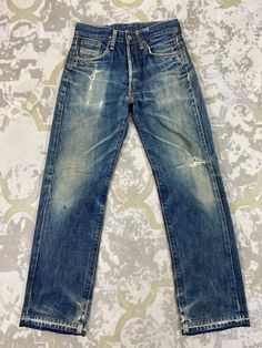 27x28.5 Selvedge Distressed Blue Vintage Edwin Jeans Denim- JN3725 Size: 27 Actual measurement (inches): Waist - 27 Front Rise - 10  Hips - 37 Thigh - 11 Knee - 8  Leg Opening - 15 Inseam - 28.5 Outseam - 38 Material : Cotton    #JN3725 Distressed Medium Wash Rigid Denim Jeans, Fitted Pre-washed Blue Jeans, Ripped Medium Wash Rigid Denim Jeans, Faded Ripped Mid-rise Jeans, Ripped Jeans In Medium Wash Rigid Denim, Mid-rise Faded Ripped Jeans, Distressed Washed Blue Straight Leg Jeans, Faded Ripped Rigid Denim Jeans, Distressed Dark Wash Denim Jeans