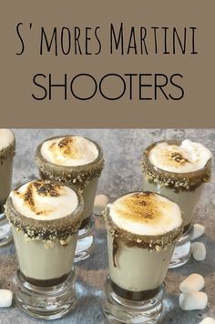 four glasses filled with marshmallows and topped with chocolate on the side, text reads s'mores martini shooters