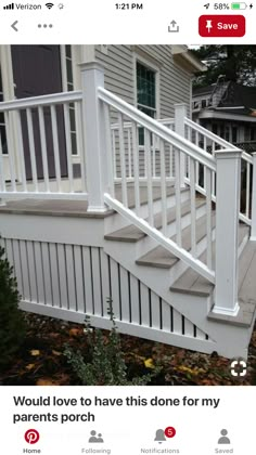 a white railing and hand rail on a deck in front of a house with trees