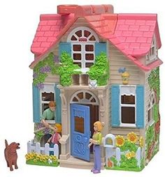 a toy doll house with a dog in front of it and a person standing outside the door