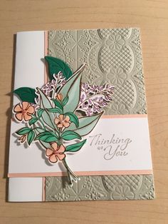 a close up of a greeting card with flowers on the front and back side,