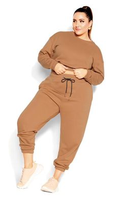 Shop Evans Biscuit Brown Cropped Sweatshirt at Yours Clothing. Discover women’s plus size clothing in sizes 10-36 with fast delivery. Cuffed Joggers, Chunky Trainers, Curve Fashion, Leggings Sale, Cropped Sweatshirt, Lounge Shorts, Cropped Tee, Printed Denim, Cropped Trousers