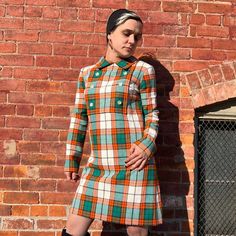 "1960s Plaid Pattern Dress Such a cute plaid dress from the 1960s! Has decorative double breasted buttons on the front and a zipper closure on the back to get in and out of. No size tag - can fit a small to medium.  Measurements: Bust: 37\" Waist: 32\" Hips: 38\" Length: 34\" Shoulder to shoulder: 15\"  Sleeve Length: 22.5\" Armhole opening: 10\" Condition: Good pre-owned condition. Lining is torn at the back. Refer to photo above." Retro Plaid Mini Dress, Fitted Retro Plaid Dress For Fall, Retro Plaid Dress For Work, Vintage Plaid Dress With Button Closure, Plaid Mini Dress, Long Sleeve Velvet Dress, Blue Velvet Dress, Pattern Dress, Dress Medium