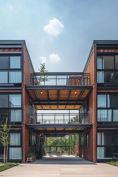 an apartment building with lots of windows and balconies