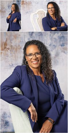 a woman with glasses sitting in a chair and smiling at the camera while posing for a photo