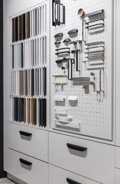 a white cabinet filled with lots of different types of items on it's sides