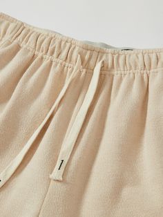 Details: Sticky Light Apricot Casual PantsLoose drawstring leg fitElasticated waistband with street drawstring Materials & Care: Polyester 63.4%, Acrylic 14.0%, Cotton 10.3%, Viscose 9.8%, Spandex 2.5% Hand wash | Dry clean Do not bleach Size & Fit: Model is 5'7", Bust 32, Waist 24, Hips 35, wearing a size S Item #: EN1PA09 Denim Jean Dress, Fall Collections, Matching Dresses, Spring Collection, Jeans Dress, Winter Collection, Short Pants, Summer Collection, Casual Pants