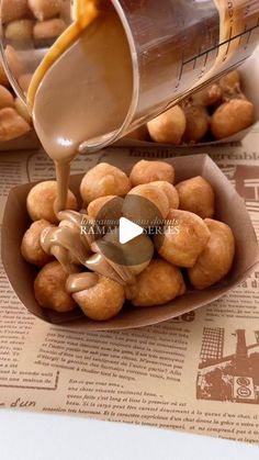 some food is being poured into a bowl