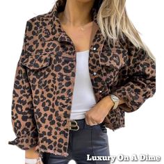 Leopard Print Denim Distressed Jean Jacket Button-Up Classic Collar Mobwife Glam Keeping It Casual For Everyday Wear, This Fierce Piece Is Versatile And Effortlessly Perfect. Featuring A Beautiful Bold Leopard Print, This Will Add A Touch Of Glamour To Any Outfit. Standard Collar Neckline And Equipped With A Functional Chest Pockets For Your Essentials Classic Hip, Cuff And Full Length Button Up Closure With A Distressed Torn Raw Frayed Hem That Creates A Worn-In Bohemian Vintage Vibe. Symbolica Brown Button-up Denim Jacket For Fall, Brown Cotton Outerwear, Fall Denim Jacket With Buttoned Pockets, Trendy Brown Denim Jacket With Pockets, Chic Button-up Denim Jacket For Fall, Chic Fall Button-up Denim Jacket, Chic Fall Denim Button-up Jacket, Leopard Print Long Sleeve Outerwear With Button Closure, Chic Denim Jacket With Snap Buttons For Fall