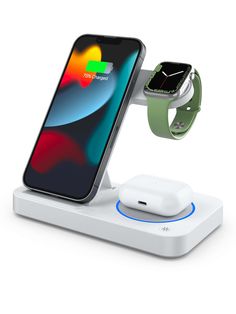 an apple watch and iphone charging station on a white surface with the dock attached to it