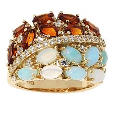 Colleen Lopez Opal and Gemstone Wide Band Ring  This sterling silver wide band ring has a chic, contrasting half-and-half design. Segmented by pavé zircons, it features oval opals on one side and your choice of gemstones on the other for a bold, gem-forward look.       Approx. 5/8"L x 1/4H; shank 1/8"W     Stamped .925 sterling silver; rhodium (Multi Tourmaline, Tanzanite) or gold plating (Madeira Citrine)   Stone Information       All sizes and weights approximate     Total Carat Weight: 2.01ct Wide Band Ring, Half And Half, Color Bands, Citrine Stone, Wide Band Rings, White Opal, Wide Bands, Gold Plating, Band Ring