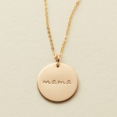 Encourager, protector, teacher, a shoulder to cry on - Mama's everywhere go by many different names but the meaning behind it is always the same. We created this necklace with our 2.5mm lowercase script font on a 5/8" disc pendant for a simple piece that's perfect for any mother's daily wear. Gold Bar Necklace Personalized, Made By Mary, Diamond Bar Necklace, Mama Necklace, Dainty Diamond Necklace, Necklace Quotes, Diamond Solitaire Necklace, Gold Bar Necklace, Solitaire Necklaces