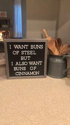 a sign that says i want buns of steel but i also want buns of cinnamon