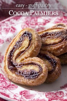 three chocolate palmiers on a plate with the words easy puff pastry cocoa palmiers