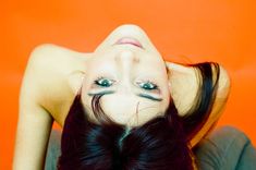 a woman with long hair and blue eyes posing for the camera stock images, royalty photos