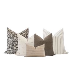 four pillows in different colors and patterns