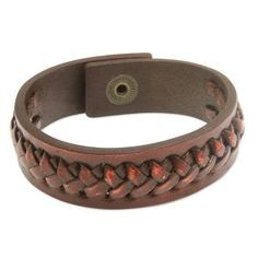 This bold bracelet by Tomomi showcases braided textures. Featuring interlacing created by hand the wristband is handcrafted of brown leather. Adjustable Brown Leather Bracelet With Wrist Strap, Brown Leather Strap Bracelet, Casual Brown Leather Strap Braided Bracelet, Casual Brown Leather Braided Bracelets, Casual Brown Leather Braided Bracelet, Casual Brown Braided Leather Bracelet, Bohemian Brown Leather Bracelet, Brown Leather Strap Wristband, Adjustable Brown Wristband With Bracelet Strap