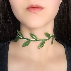 "A leafy vine choker fit for a forest elf! This necklace features green cutout grosgrain ribbon, cream satin picot ribbon backing and bronze adjustable hardware. The length shown in photos is 12\" and more options are available. Each size comes with an additional 2.5\" extender chain. When selecting necklace length, measure around the smallest part of your neck. If you're in between sizes, go for the next smallest size and use the extender chain for the perfect fit! If you would like a custom si Clothes Made Of Leaves, Forest Elf Outfit, Forest Fairy Costume Diy, Forest Elf Costume, Woodland Elf Costume, Girl Elf Costume, Fairycore Accessories, Forest Fairy Costume, Leaf Accessories