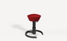 a red stool sitting on top of a black metal base with a circular foot rest