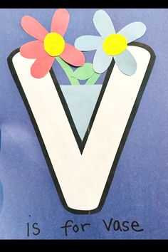 the letter v is for vase with flowers in it