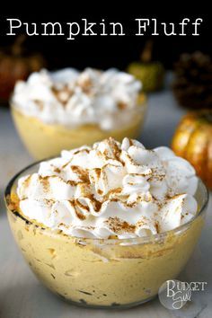 pumpkin fluff in a glass bowl with whipped cream on top