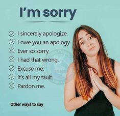 a woman standing in front of a blue background with the words i'm sorry on it