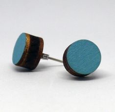 two tone wooden studs with blue wood in the middle