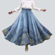 Make a bold statement this summer with our 2023 Spring-Summer Collection Bohemian Flower print denim skirt! Featuring a boho-style. this long. high-waisted skirt with embroidered details and rubber closure is the perfect blend of contemporary fashion and nostalgic grunge.Why You'll Love It: Embroidered Details: Delicate floral embroidery on the edges of this skirt brings a touch of boho-inspired style. Long & High-Waisted: The length and high-waisted cut of this skirt accentuate any figure. maki Non-stretch High Waist Denim Skirt For Spring, Bohemian Spring Maxi Skirt, Bohemian Flowy Maxi Skirt For Spring, Denim Blue Patchwork Skirt For Summer, Spring Denim Skirt With Patchwork, Summer Denim Blue Patchwork Skirt, Spring Denim Blue Skirt With Patchwork, Summer Denim Bottoms With Floral Patchwork, Flowy Bohemian Maxi Skirt For Spring