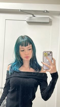 vivid blue hair and edgy blunt bangs, this look is the perfect blend of dark gothic fashion with vibrant colors. Discover more   **Hashtags:** #gothicstyle #gothaesthetic #gothhair #altfashion #vividcolors #bluntbangs #bluehair #alternativefashion #darkfashion #gothicbeauty #altstyle #hairinspiration #hairgoals #gothmakeover #gothfashion V Bangs, Dark Gothic Fashion, Turquoise Hair, Alt Style, Goth Hair, Dark Gothic, Goth Aesthetic, Alt Fashion, Gothic Beauty