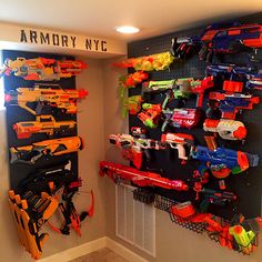 We are ready for the zombie apocalypse! Easy one day project that cost under $50!  Supplies Needed.. 3 2ftx4ft peg boards  4 1X4 strapping Mounting screws Pegs Paint Stencils Weapons;) Peg Boards, Boys Bedroom Makeover, Nerf Toys, Boys Playroom, Paint Stencils, Teen Boy Bedroom, Boys Bedrooms